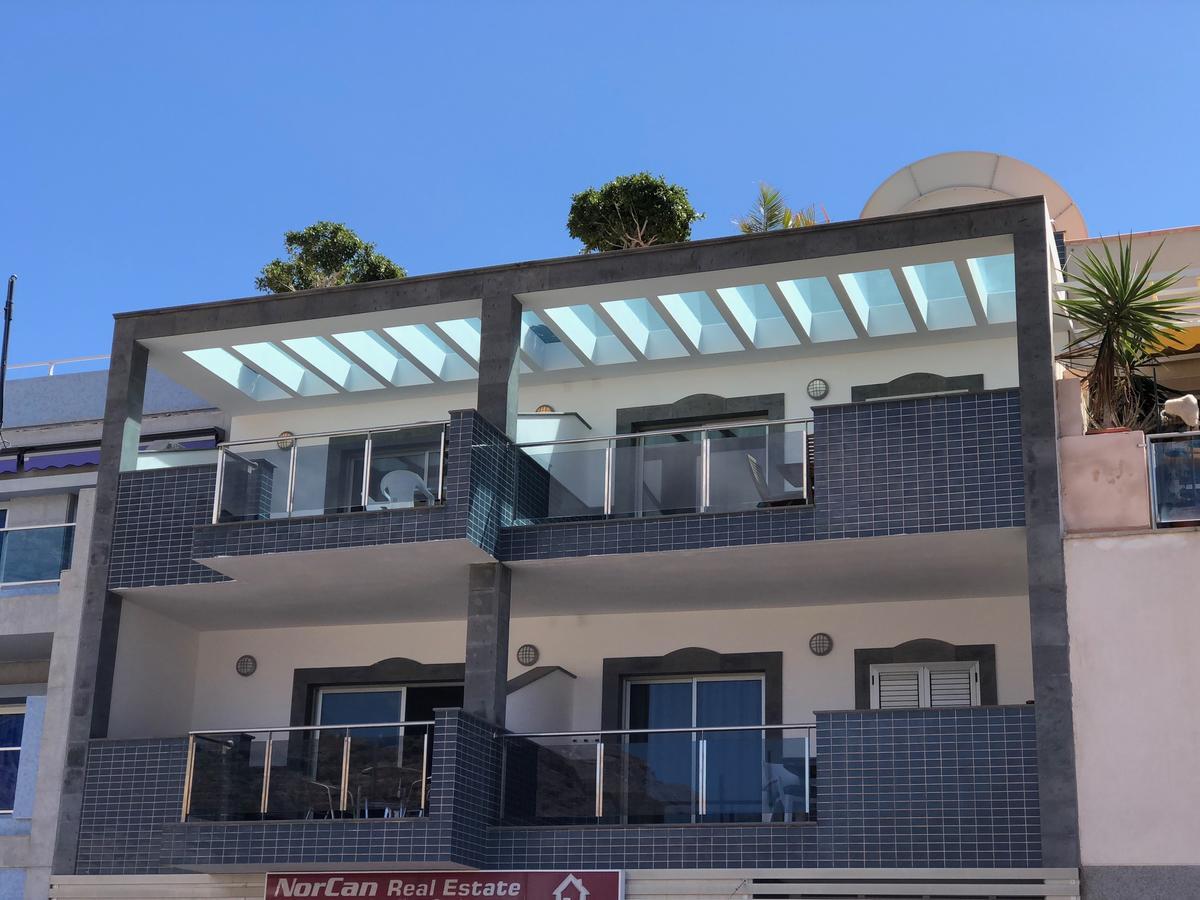 Billy'S Beachfront Apartment With Pool Access Puerto De Mogan Extérieur photo
